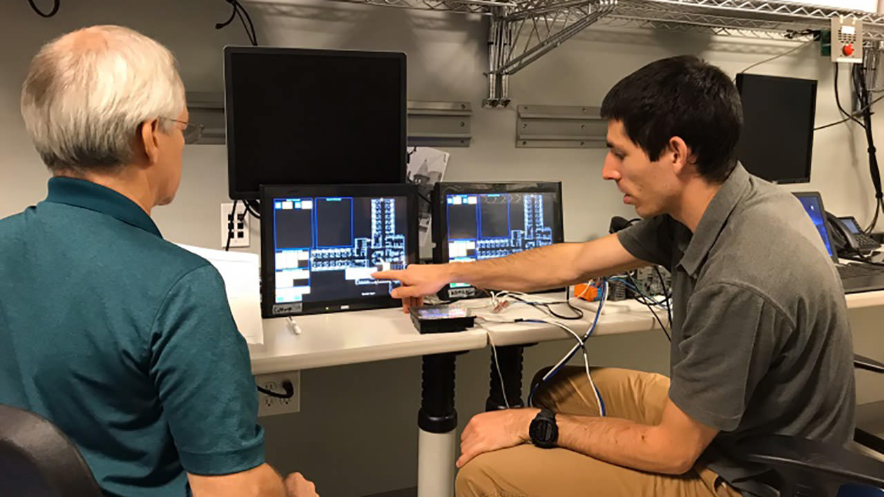 Integrator configures MicroSmart PLCs and HMIs to meet door security and intercom requirements.