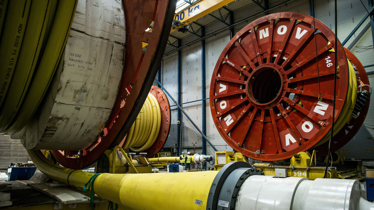 Some pipes are as long as 12-14 kilometers, and they are stored and transported around the plant on huge reels.