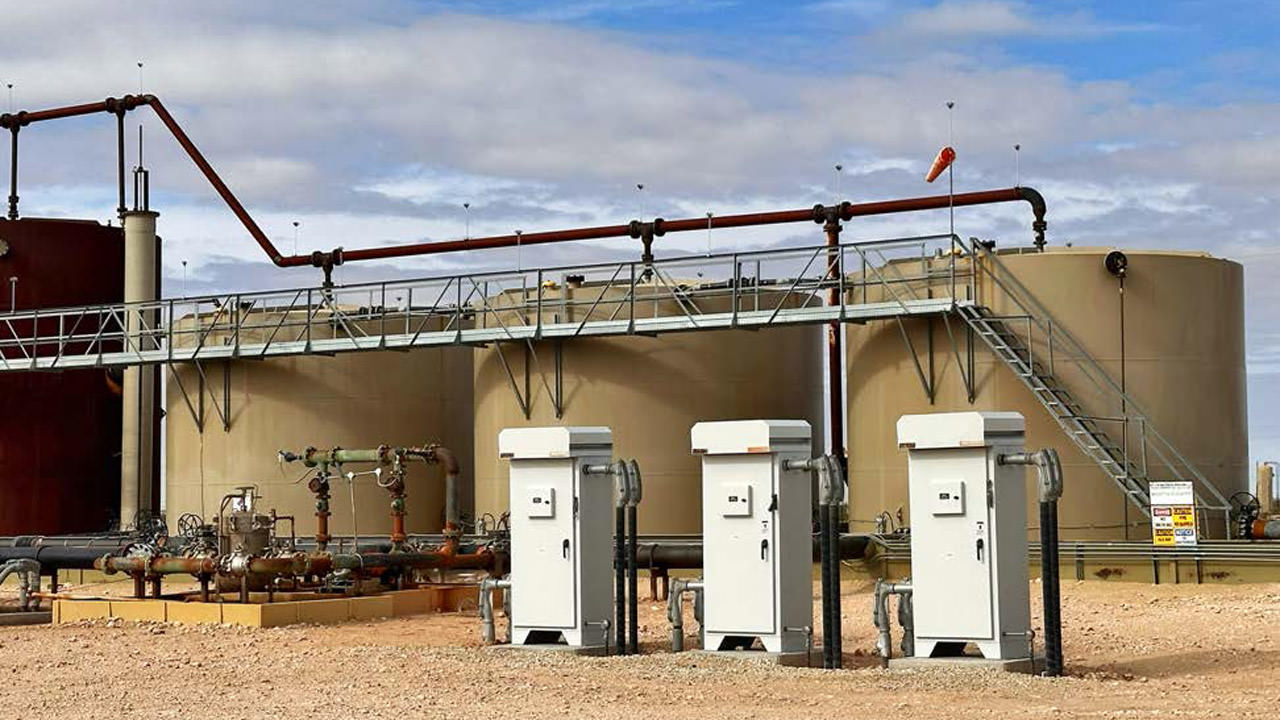 Tanks at Point Energy Partners SWD site.